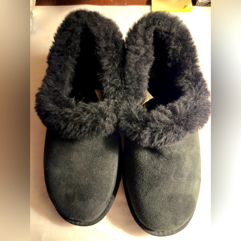 UGG Black shearling cozy slippers with rubber sole. Ladies size 9 Never worn.